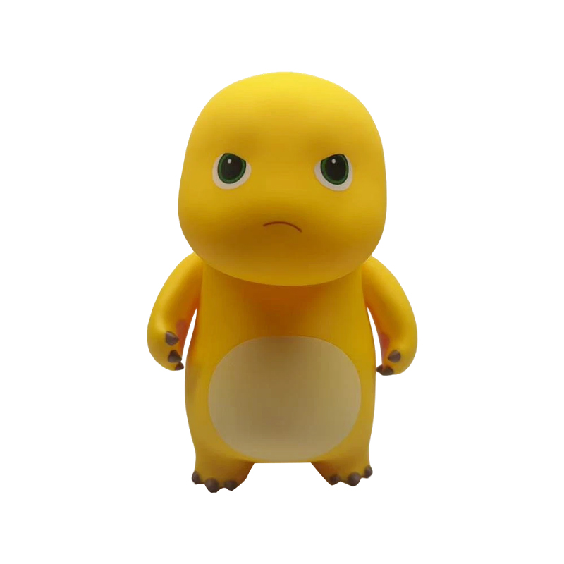 How does the plasticity and coloring properties of vinyl affect the details of the naughty milk dragon ornament?