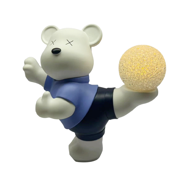 How do vinyl bear ornaments reflect creativity?